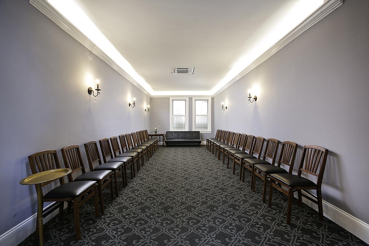 San Jose Funeral Home Chapel with couch and chairs